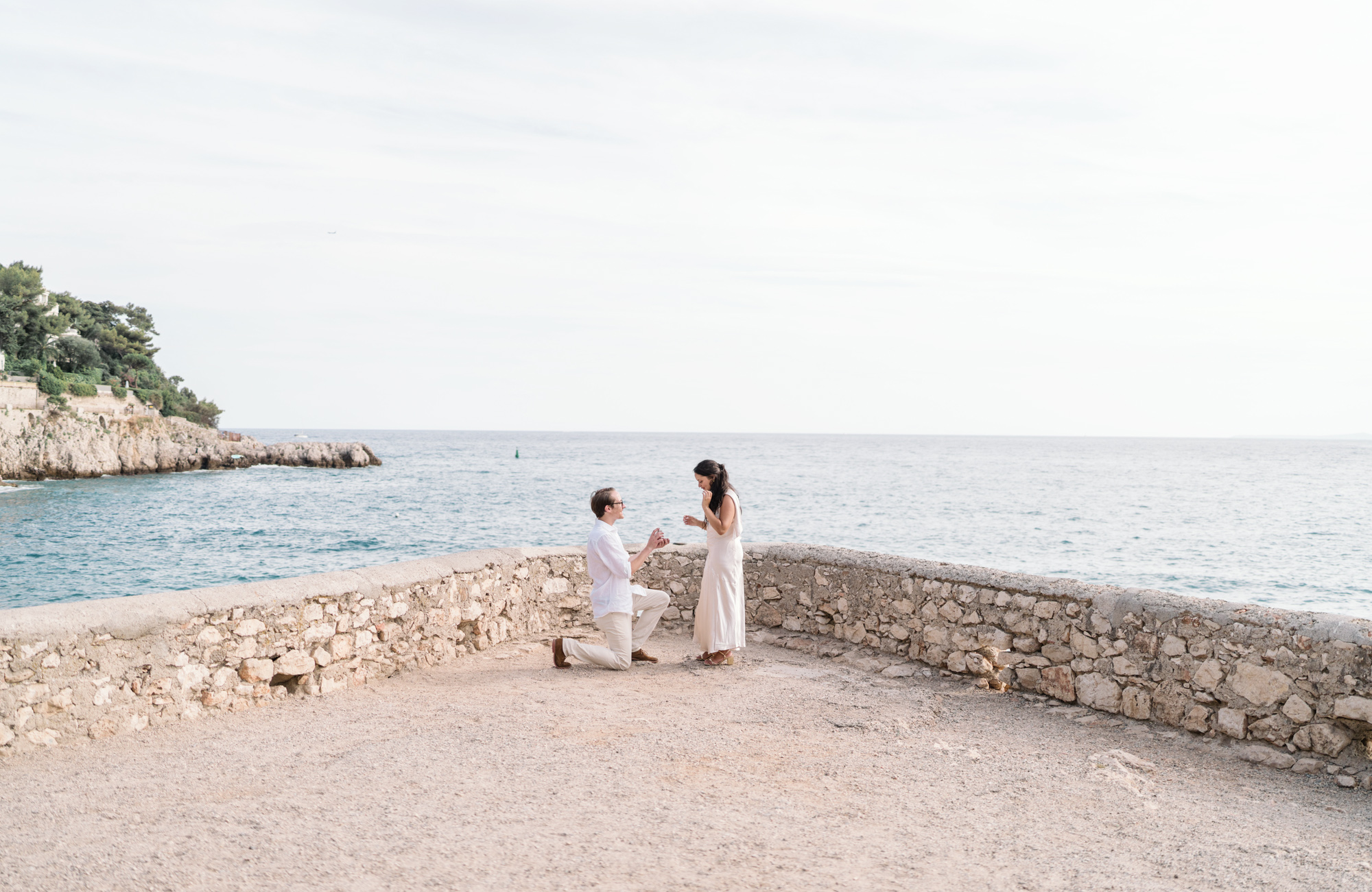 man on one knee proposing at coco beach nice