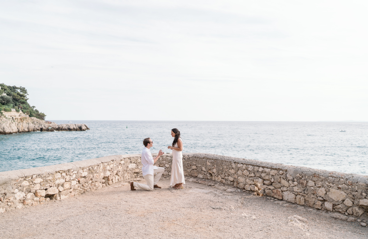 man proposing to woman on coco beach in nice france