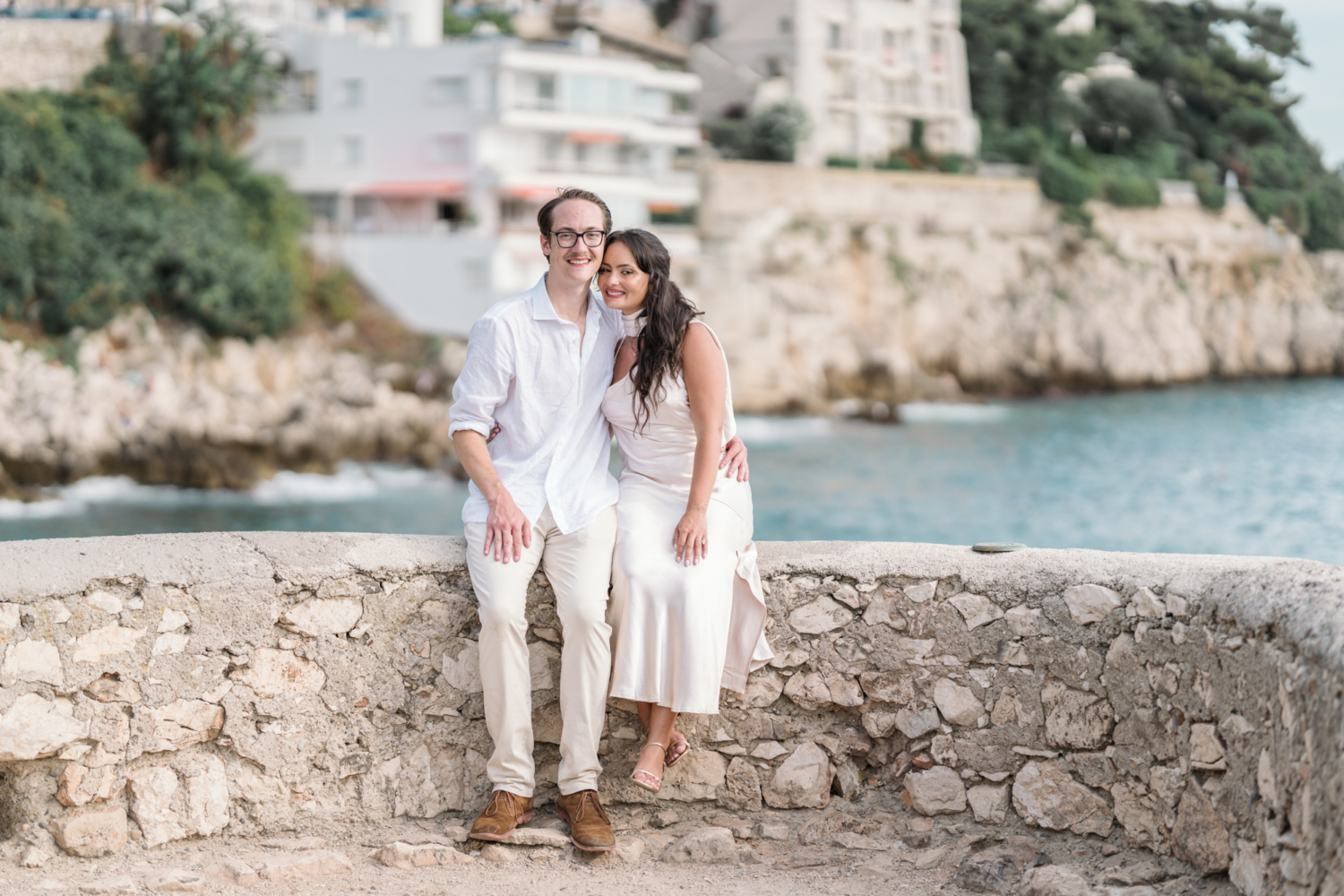 couple pose after their engagement on coco beach nice