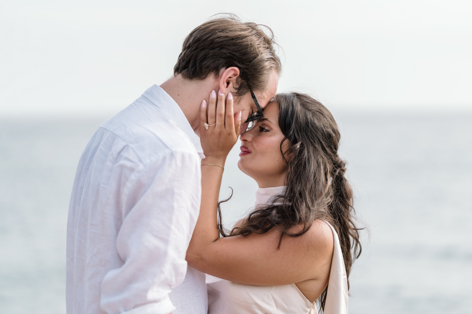 beautiful couple newly engaged embrace in nice france