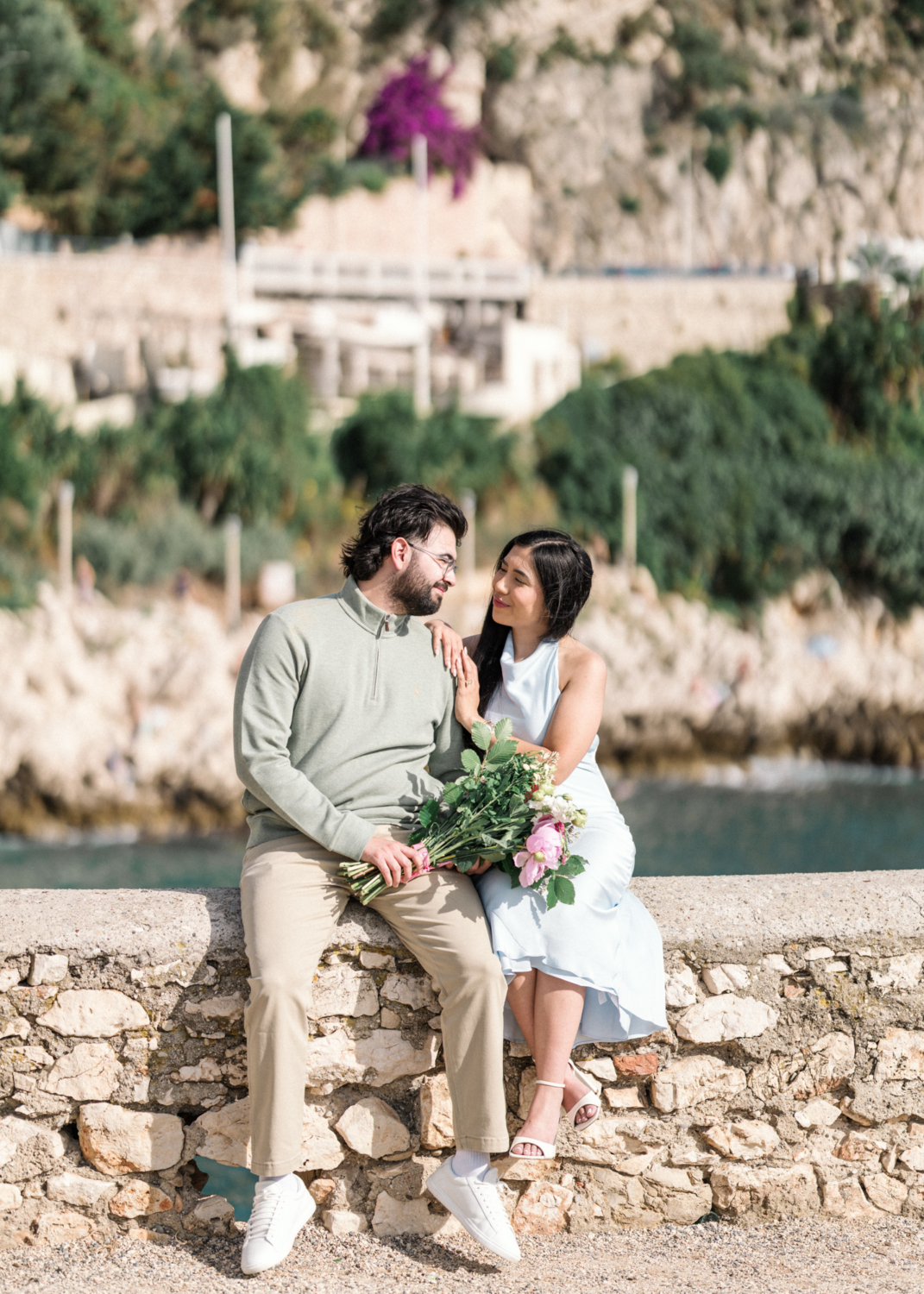 happy couple pose after their surprise proposal in nice, france