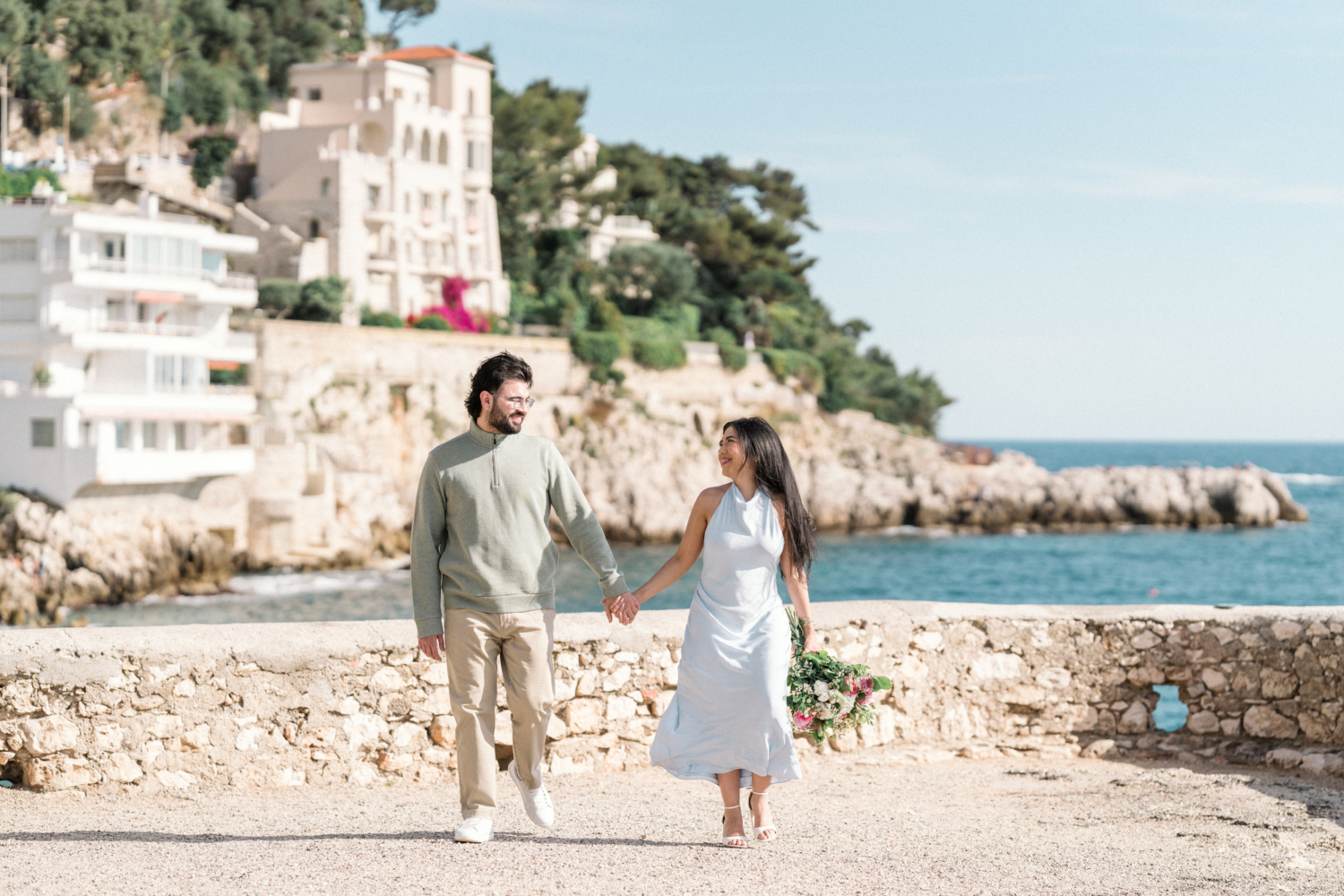 engaged couple walk at coco beach in nice, france