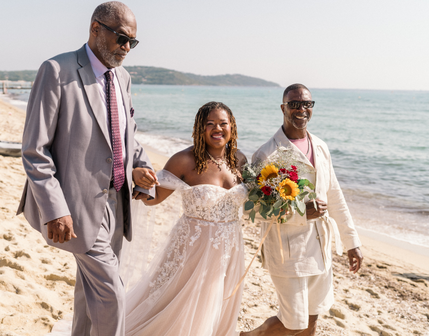 bride walks in with dad and stepdad to ceremony in saint tropez