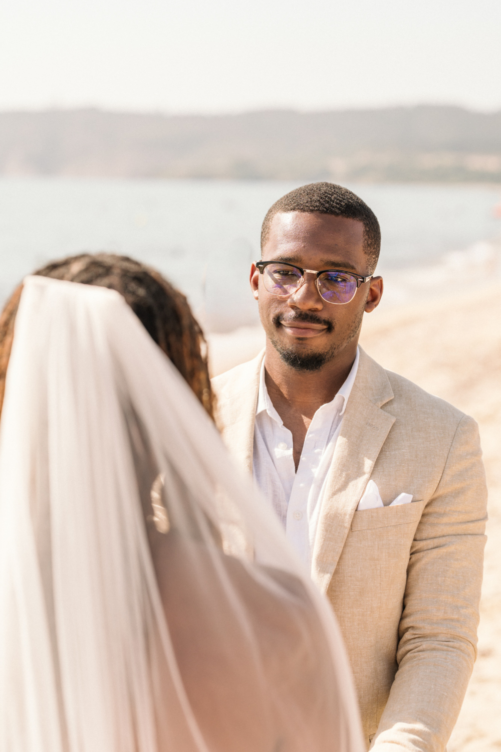 groom looks lovingly at bride in saint tropez