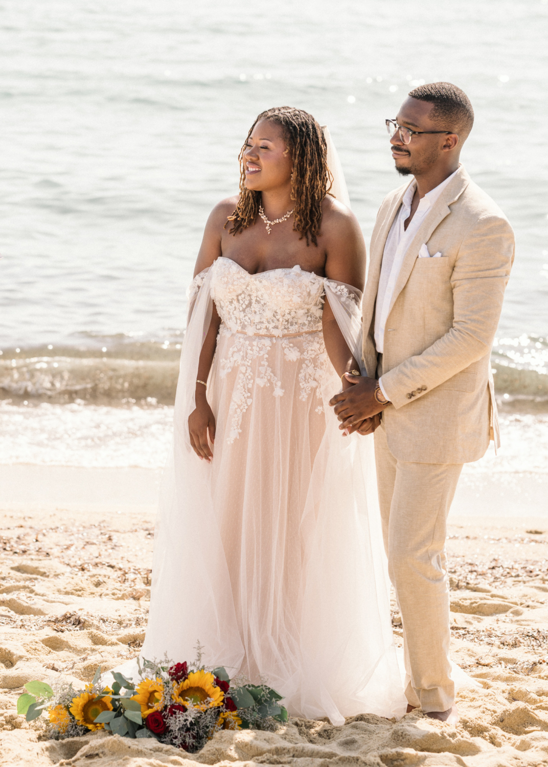 bride and groom during their wedding on the beach in saint tropez