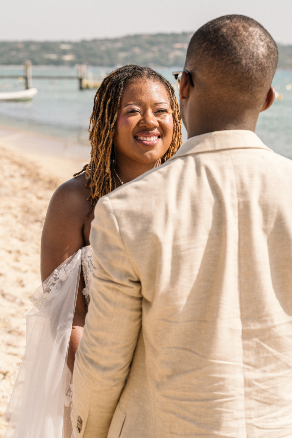 bride smiles during wedding ceremony in saint tropez