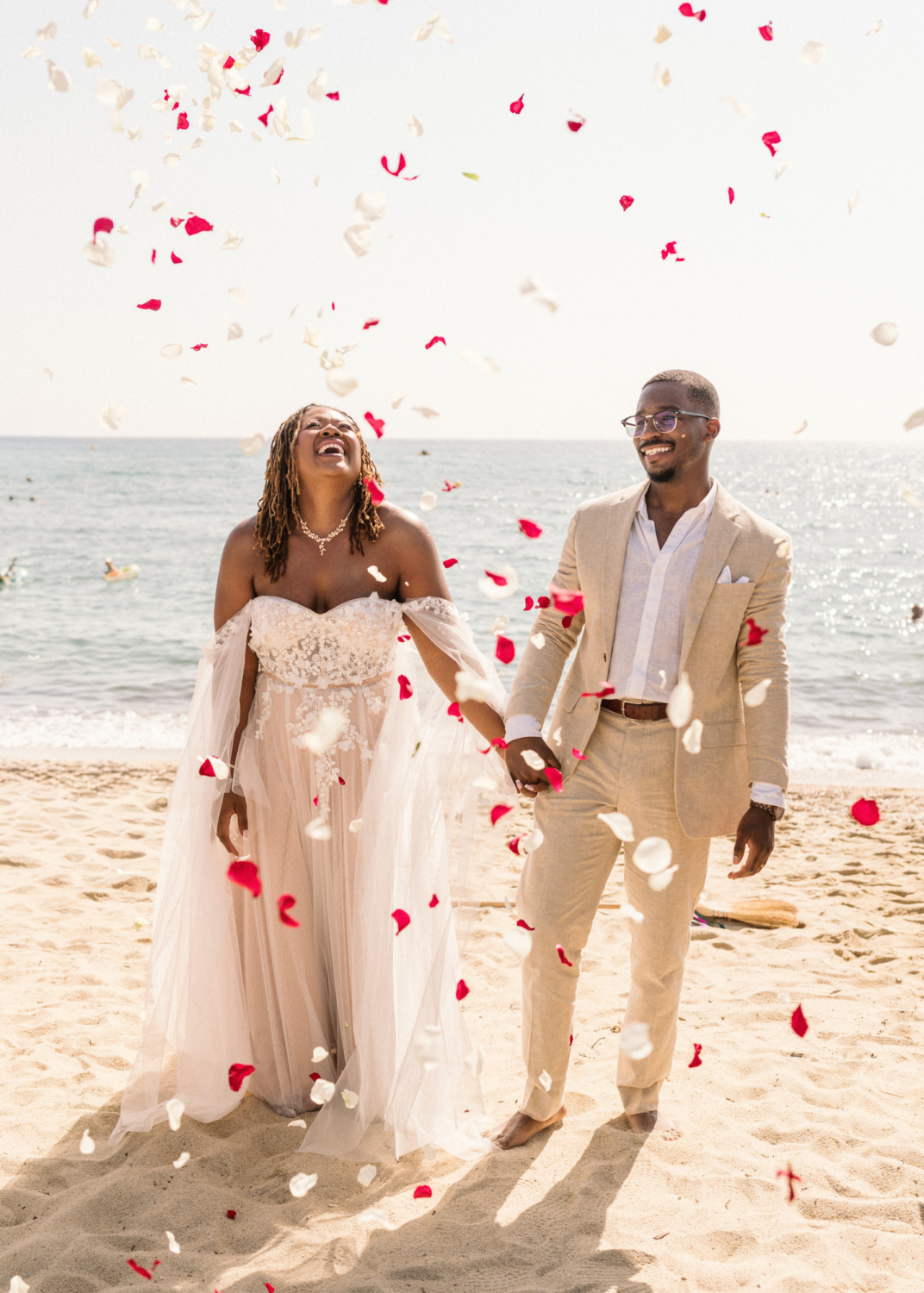 bride and groom in confetti on the beach in saint tropez