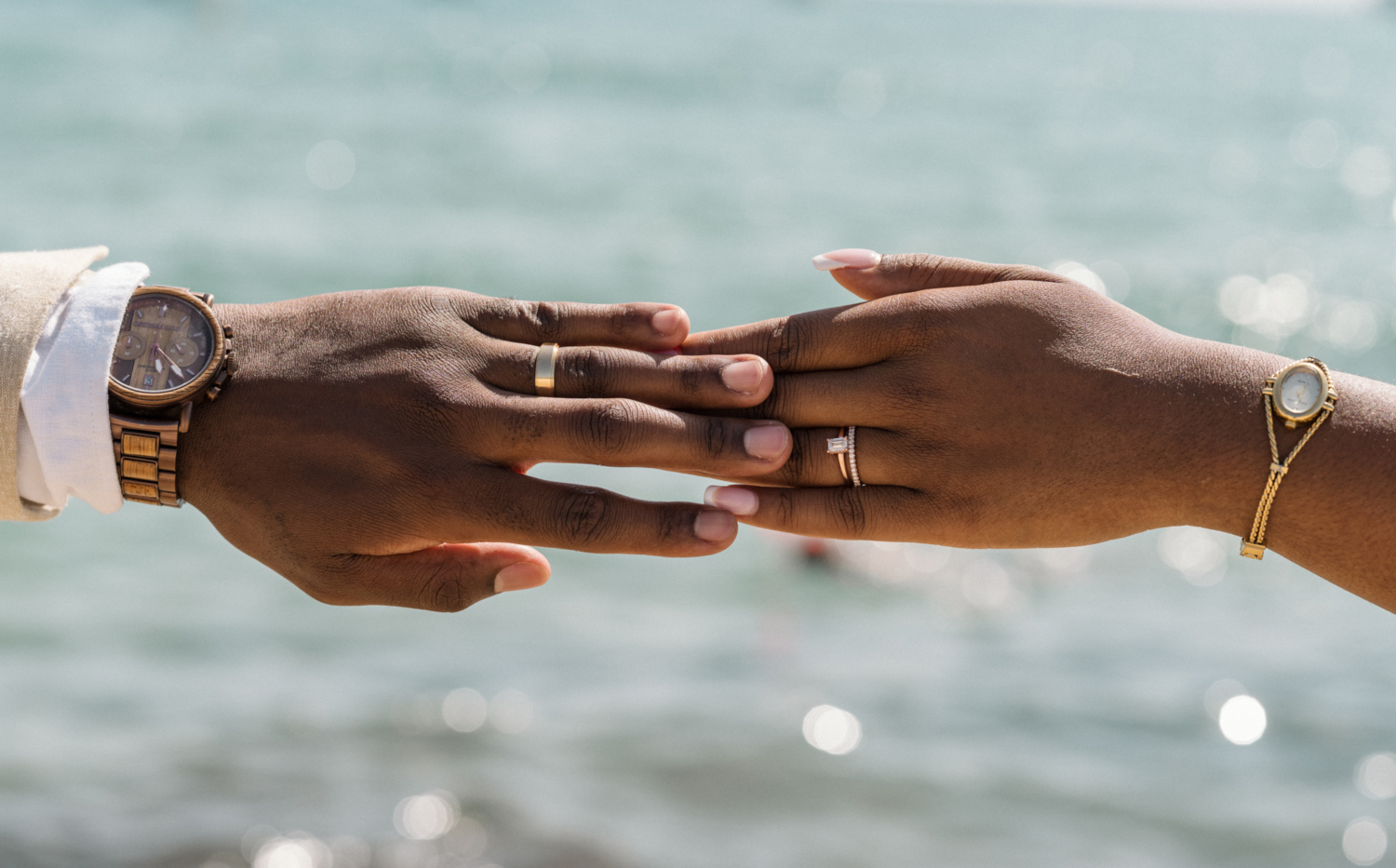 bride and groom show off their rings in saint tropez